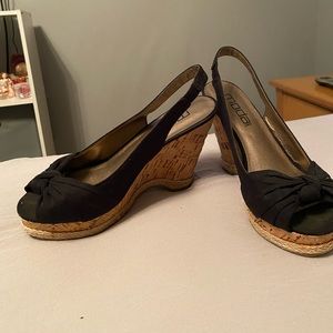 Black wedges with a bow